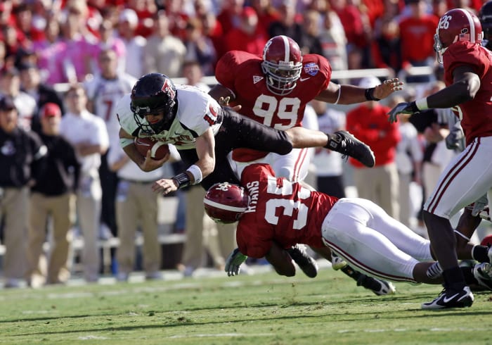 Alabama linebacker Demeco Ryans tackles a Texas Tech ballcarrier.